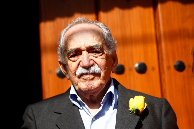 Colombian author Gabriel Garcia Marquez stands outside his house on his 87th birthday in Mexico City
